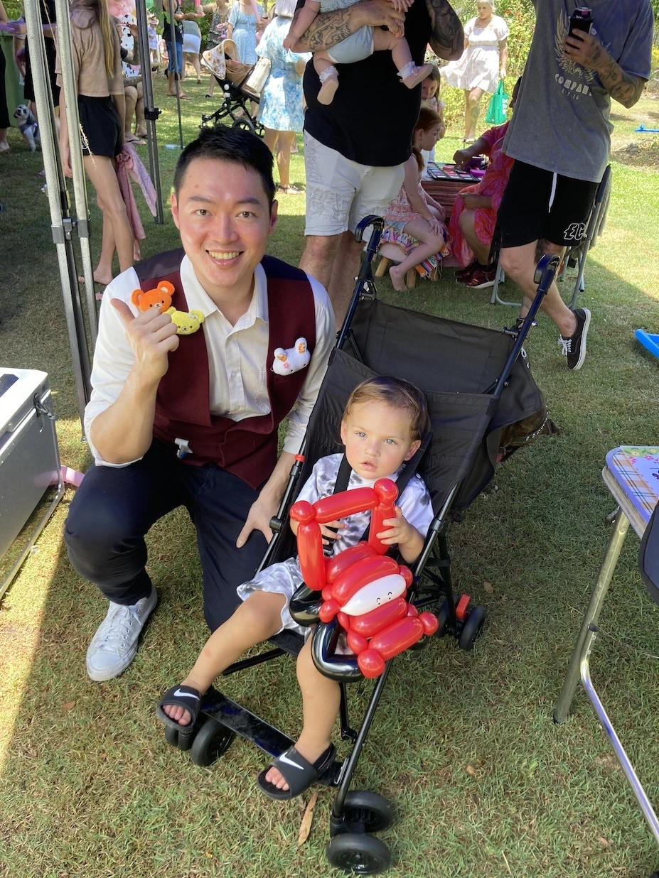 joe and a kid at a birthday party