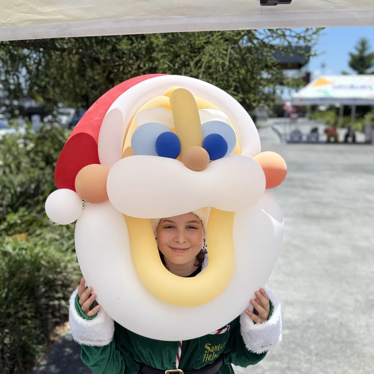 Balloon twisting entertainment at a school fete in Brisbane
