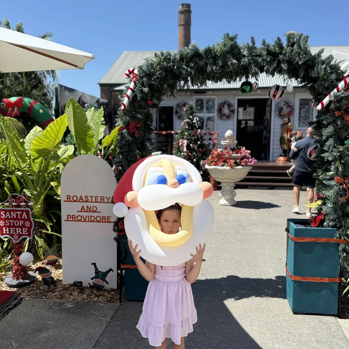 Happy kids with balloon animals at a Brisbane community event